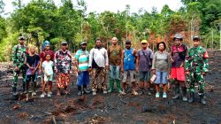 Babinsa Numfor dan Petani Tanam Padi Ladang