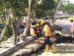 Babinsa Bantu Pengukuran Lokasi Pembangunan Kampung Nelayan
