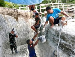 Karang Keras Tak Halangi Semangat Prajurit Kodim 1708/BN Membangun Jembatan