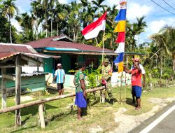 Babinsa Biak Barat Ajak Warga Pasang Bendera Merah Putih